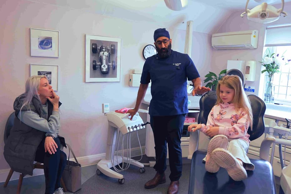Dental hygienist performing professional teeth cleaning for oral hygiene